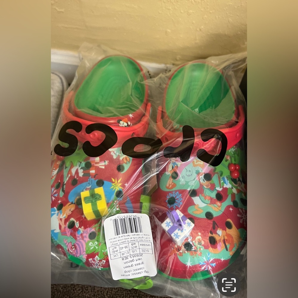 Crocs new, limited edition Disneyland, size 9.